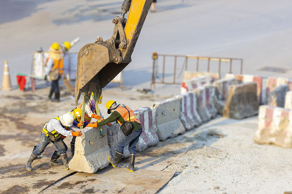 Concrete barrier to protect workers