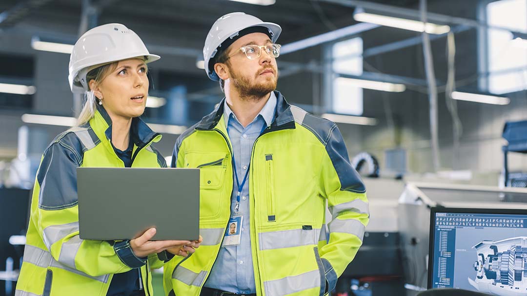 Two safety managers in manufacturing facility