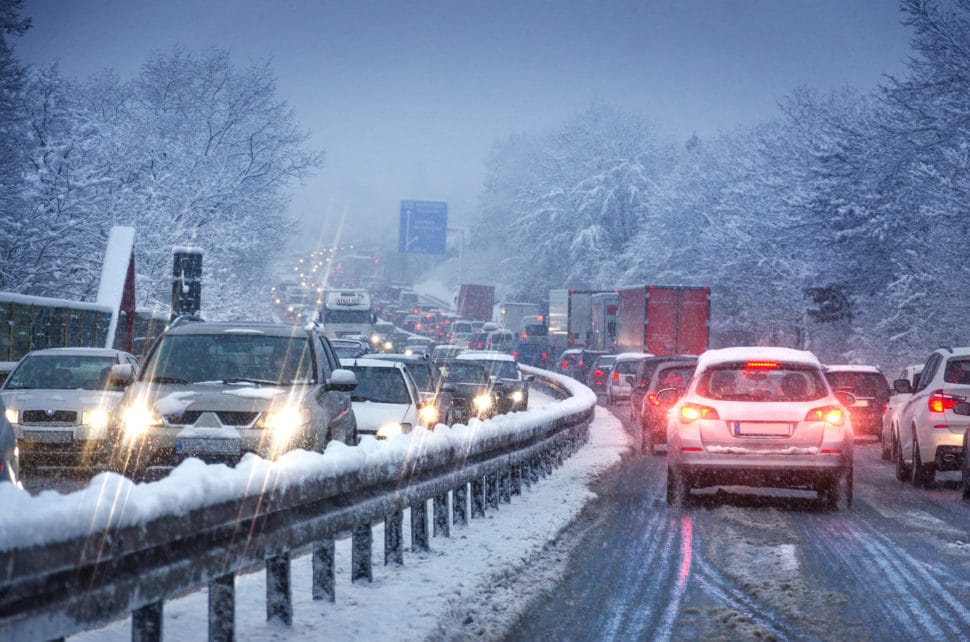 Cars lined in traffic in winter weather