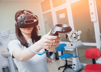 woman taking safety training with virtual reality device