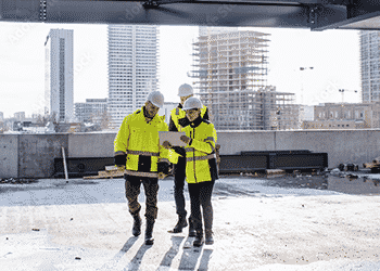 construction workers using tablets for safety